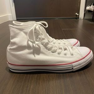 Brand new, never worn, white high top converse in men’s 9.5.